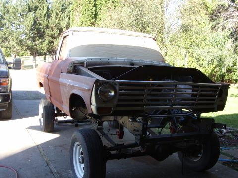 1967 Ford F-250 - This 1967 Ford F-250 pickup truck is in primer and appears to be undergoing restoration work.