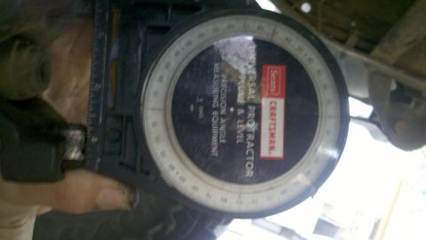 1978 Ford Bronco - A close-up of a Craftsman universal protractor and ruler, likely used for automotive work.