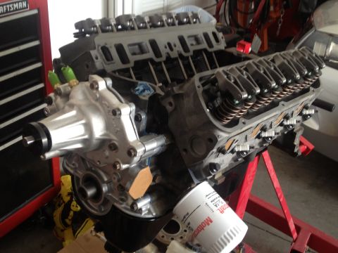 1965 Ford Mustang - 302 with Ford Racing Rear Sump pan, new timing cover, and Edelbrock Victor water pump installed