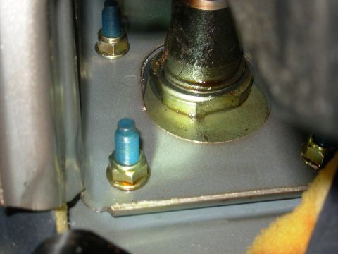 1997 Chevrolet Silverado 3500 - With the foam pad pulled down to expose the nuts, I could see that the booster was also leaking inside, though not nearly as severely.