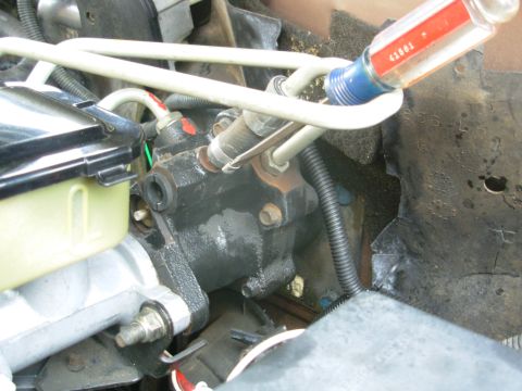 1997 Chevrolet Silverado 3500 - This is the easiest way to open a keystone clamp: jam a flathead in and twist it every way.