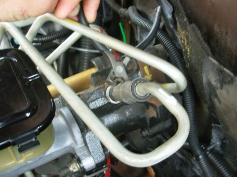 1997 Chevrolet Silverado 3500 - If I needed to reuse the clamp, it's easy to re-crimp it with end-cutting pliers. To make sure it tightens, jam the same flathead back insi…