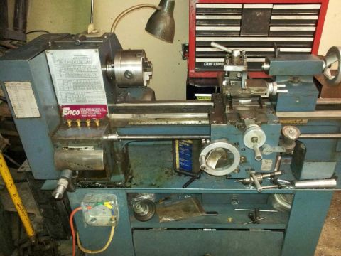 1989 Ford Bronco - A metal lathe is shown with various controls and a label indicating the manufacturer.