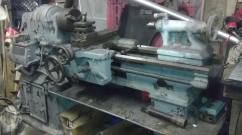 1989 Ford Bronco - Industrial metal lathe with various controls and components visible.