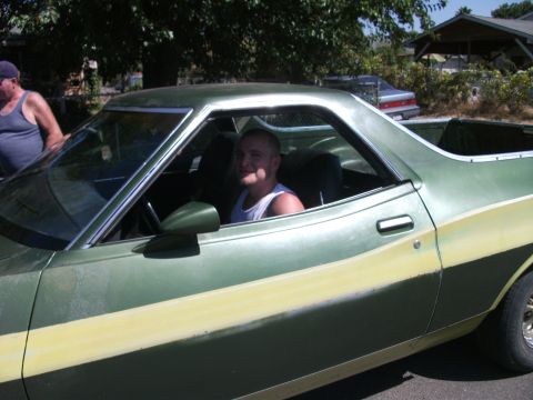 1972 Ford Ranchero - 1972 Ford Ranchero with a two-tone paint scheme and a driver inside.