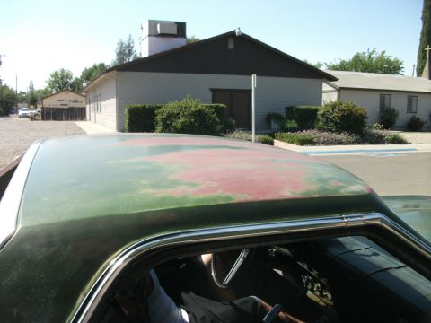 1972 Ford Ranchero - The worn paint on this vehicle's roof shows signs of age and previous color layers.