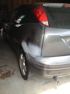 2007 Ford Mustang - Rear view of a 2007 Ford Focus hatchback with bodywork in progress.