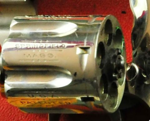 1968 Ford Mustang - Close-up of a revolver cylinder showing "Springfield, Mass." and "U.S.A." markings.