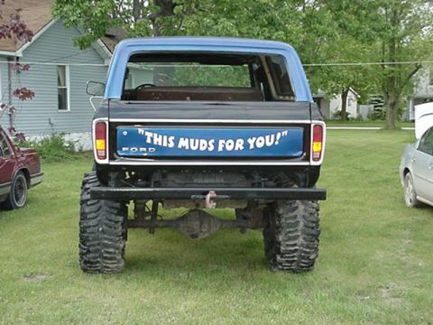 1979 Ford Bronco - Rear view of a lifted 1978 Ford Bronco with custom tailgate text reading "THIS MUDS FOR YOU!".
