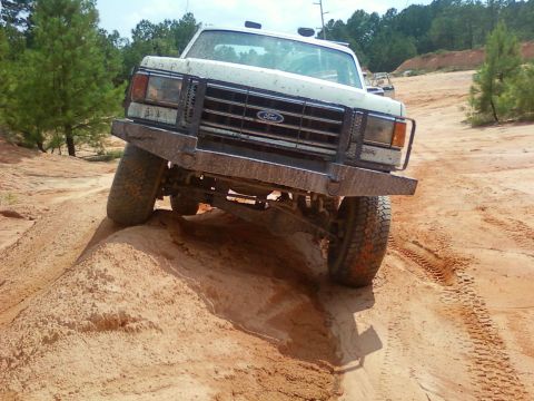 1979 Ford Bronco - This 1979 Ford Bronco navigates a challenging off-road course, its capabilities.