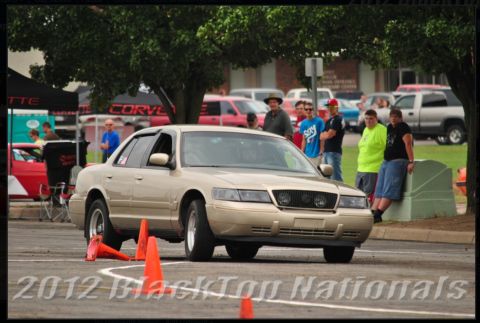 2000 Mercury Grand Marquis - Gold 2000 Mercury Grand Marquis on an autocross course.