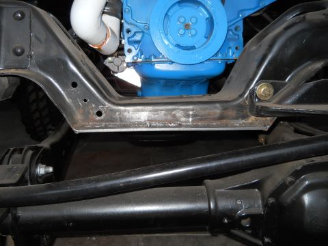 1992 Ford Bronco - Undercarriage view showing the frame and engine of a vehicle, with a Supermotors.net watermark.