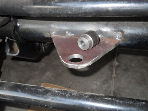 1992 Ford Bronco - Custom bracket with rubber isolator attached to vehicle frame.
