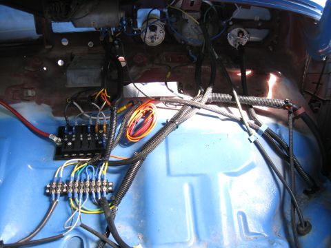 1970 Volkswagen Beetle - Custom wiring installation with multiple fuse blocks and terminal strips visible.