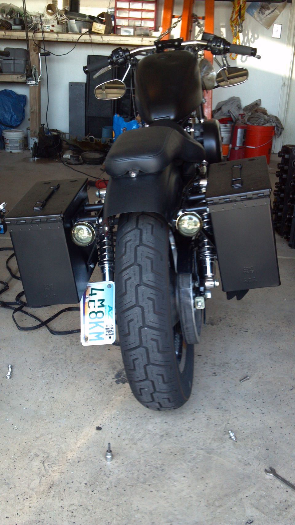 Black motorcycle with saddlebags and license plate