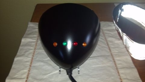 2002 Harley-Davidson XL Sportster - Motorcycle headlight assembly with indicator lights is shown on a table.