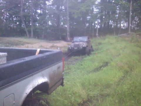 1993 Ford F-150 - Friend sunk his jeep pretty good, hooked the winch up to my truck, by time I got to taking the picture he was pretty much out