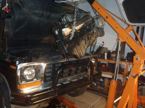 1978 Ford Bronco - Engine removal in progress on a 1979 Ford F-Series truck.