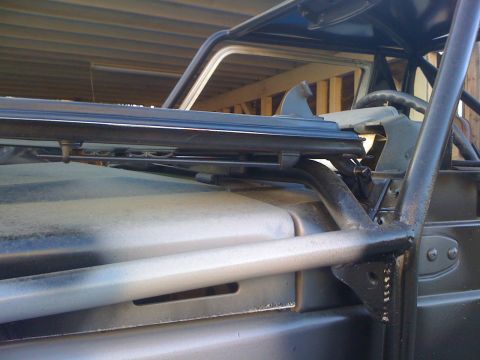1987 Suzuki Samurai - Close-up view of the interior structure and dashboard of an off-road vehicle.
