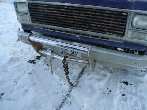 1981 Ford Bronco - whoops... I guess the push bar wont hold up forever!! (note yellow strap from past tugs..)