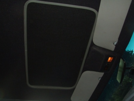 1996 Ford Bronco - View of the interior sunroof and visor, with a Supermotors.net watermark visible.
