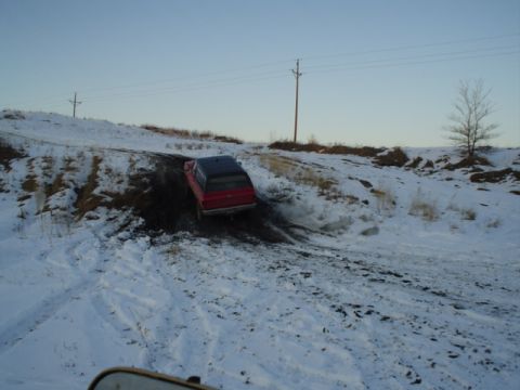 1981 Ford Bronco - Ben climbing the slippery hill