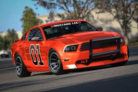 2007 Ford Mustang - This 2007 Ford Mustang is painted orange and features the number 01 on its side.