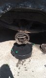 1979 Ford Bronco - A disassembled drum brake assembly is shown, likely during a repair or maintenance process.