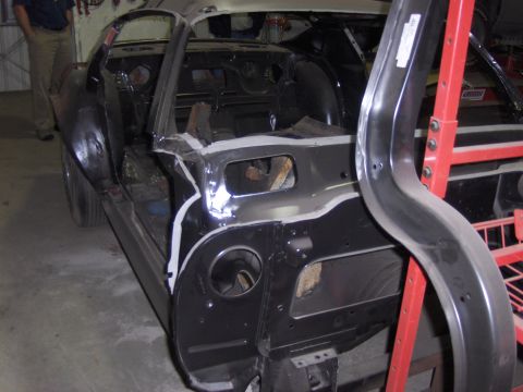 1970 Chevrolet Camaro - This vehicle's rear section is undergoing restoration, with exposed metal and structural components visible.