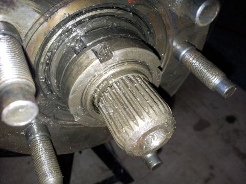 1994 Ford Ranger - Detail of a wheel bearing assembly, showing the splined shaft and greased components.