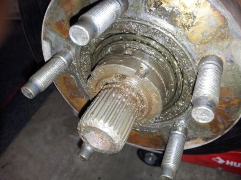 1994 Ford Ranger - Wheel hub assembly showing splines and lug studs, heavily greased.