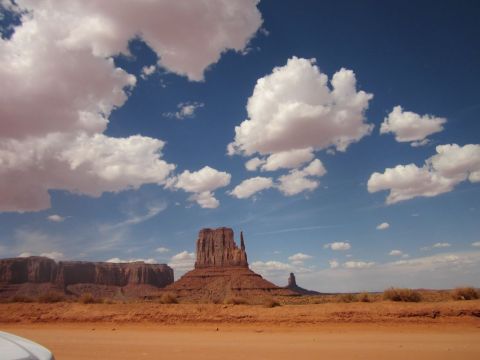 1991 Ford LTD Crown Victoria - Monument Valley, Arizona, USA. A scenic desert landscape with iconic rock formations.