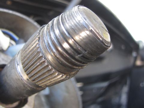 1964 Ford Ranchero - Worn steering shaft splines show damage to the threaded end, indicating potential wear and tear.