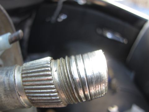 1964 Ford Ranchero - Close-up view of the splined end of a steering column shaft, showing wear on the splines.