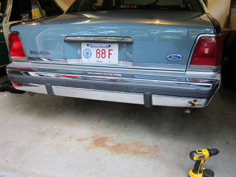 1991 Ford LTD Crown Victoria - Rear view of a light blue Ford Crown Victoria with a chrome bumper and Massachusetts license plate.