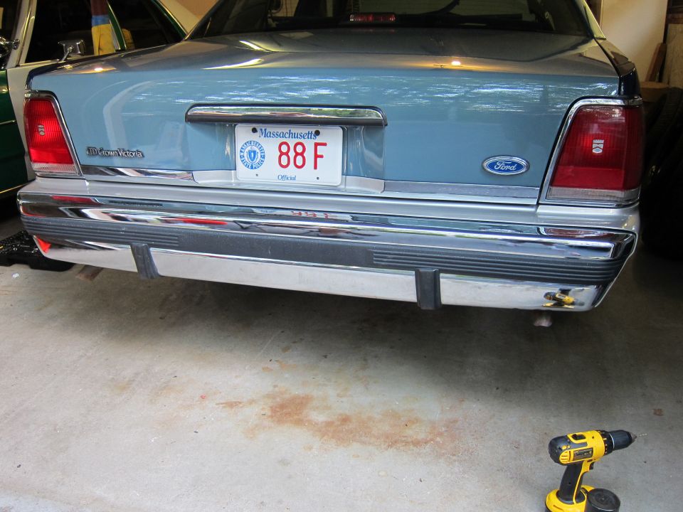 Light blue Ford Crown Victoria rear, chrome bumper, Massachusetts license plate 88F