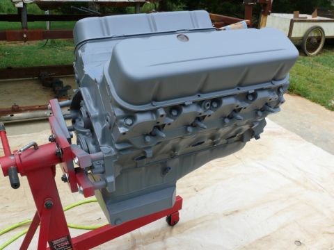 1968 Chevrolet Camaro - V8 engine on a red stand, ready for installation or rebuild.
