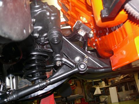 1968 Chevrolet Camaro - Close-up view of front suspension parts and an orange engine block, with Supermotors.net watermark.