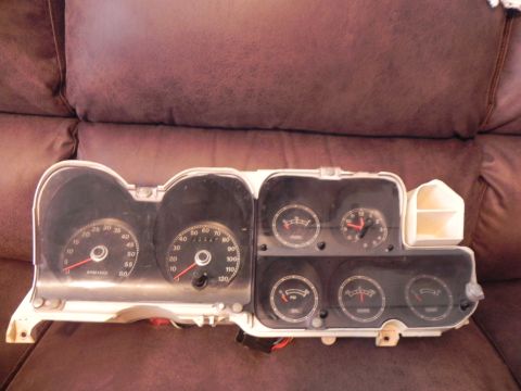 1974 Ford Ranchero - A vehicle's dashboard instrument cluster is shown, a speedometer and tachometer.