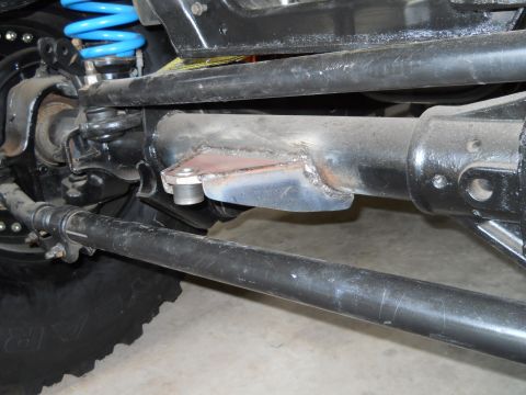 1992 Ford Bronco - Undercarriage view shows suspension parts and a portion of a tire.