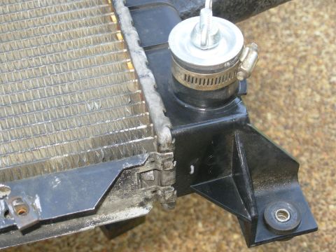 1983 Ford Bronco - The hose clamp around the nipple prevents the expansion plug from splitting it. At 13psi again, the leak is rapidly diminishing... Eventual…