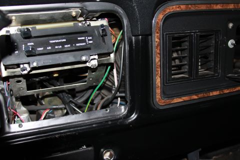 1979 Ford F-350 - Close-up of the dashboard climate controls and air vents in a 1979 Ford F-350.