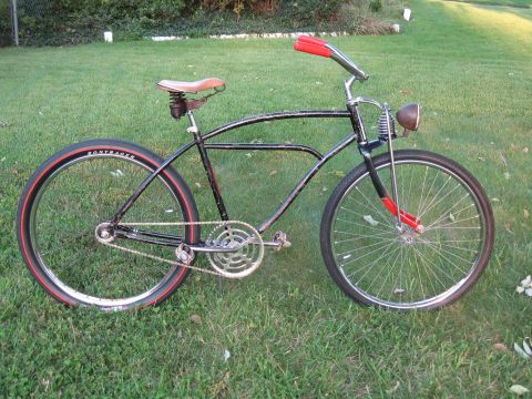 1994 Ford Bronco - Custom cruiser bicycle with vintage styling and modern tires sits on a grassy lawn.