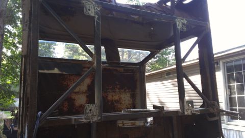 1978 Ford Bronco - This heavily rusted vehicle frame appears to be undergoing modifications, possibly for off-road use or a custom build.