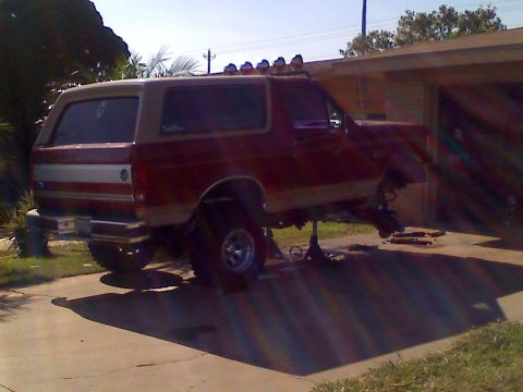1990 Ford Bronco - This 1990 Ford Bronco is raised on jack stands for maintenance, revealing its undercarriage.