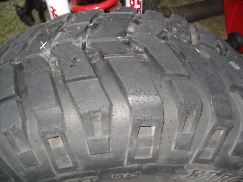 1990 Ford Bronco - Aggressive off-road tire tread detail, showing the M+S marking.
