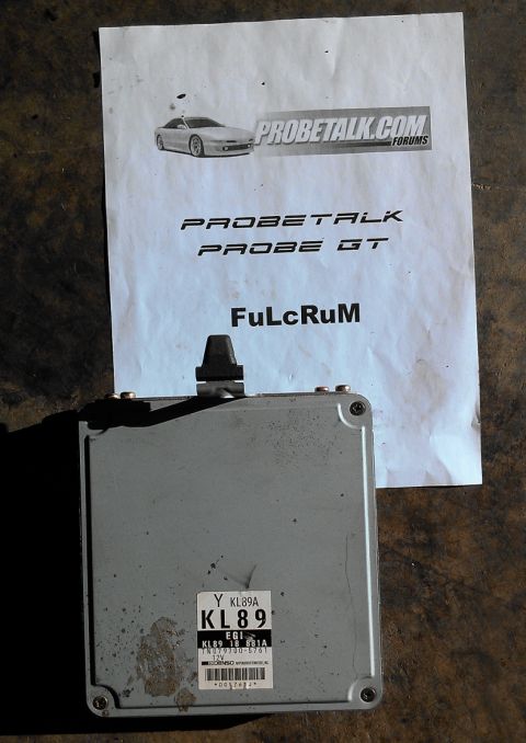 1995 Ford Probe - Engine control unit for a 1995 Ford Probe GT, shown with a Probetalk.com document.