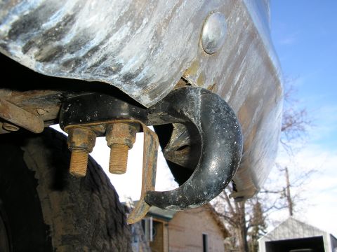 1986 Ford Bronco - I used one existing bolt hole, and drilled a 2nd one in the frame horn. To clear the bumper, I had to notch it a little bit.