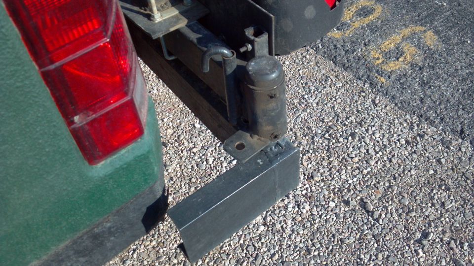 Close up of a hinge unit.  Purchased from comp4x4.com, it supports the weight of the spare tire or jerry cans   cooler just fine.