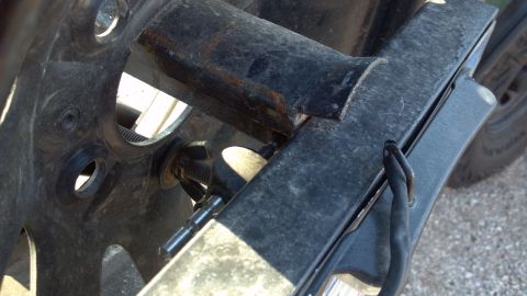 1986 Ford Bronco - My removable license plate bracket. It locks in place with a locking pin, which keeps the spare tire secure. The plate itself is secured wi…